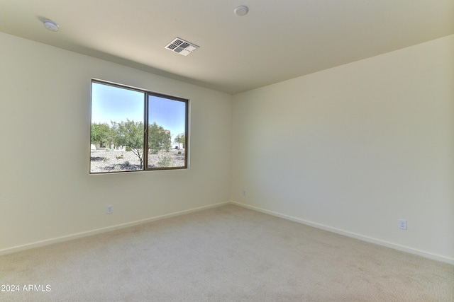 4320 Sawbuck Way, Wickenburg, AZ 85390 - unfurnished room featuring baseboards, light carpet, and visible vents