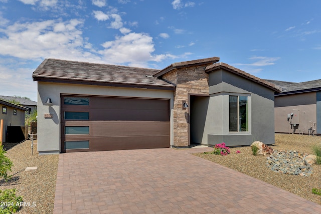 view of front of home with a garage