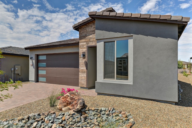 view of front of property with a garage