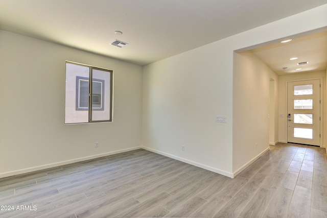 4320 Sawbuck Way, Wickenburg, AZ 85390 - unfurnished room with baseboards, light wood-type flooring, visible vents, and recessed lighting