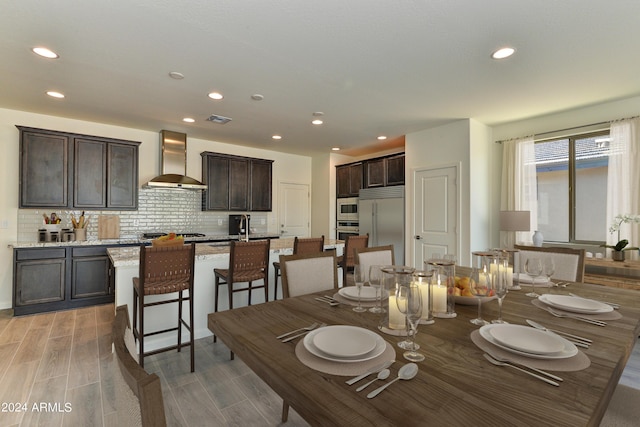 4320 Sawbuck Way, Wickenburg, AZ 85390 - dining area with visible vents, light wood-style flooring, and recessed lighting
