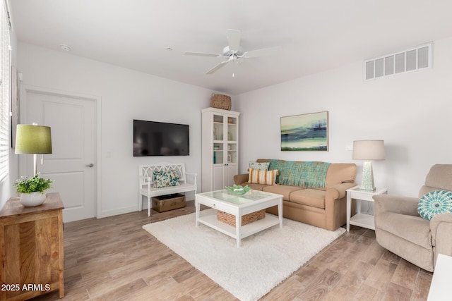 2511 W Queen Creek Rd Unit 174, Chandler, AZ 85248 - living room featuring light wood-style flooring and a ceiling fan