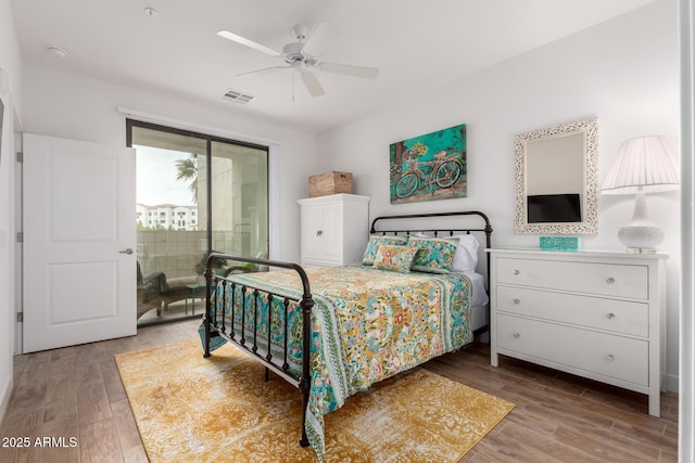 2511 W Queen Creek Rd Unit 174, Chandler, AZ 85248 - bedroom featuring wood finished floors, access to outside, and a ceiling fan