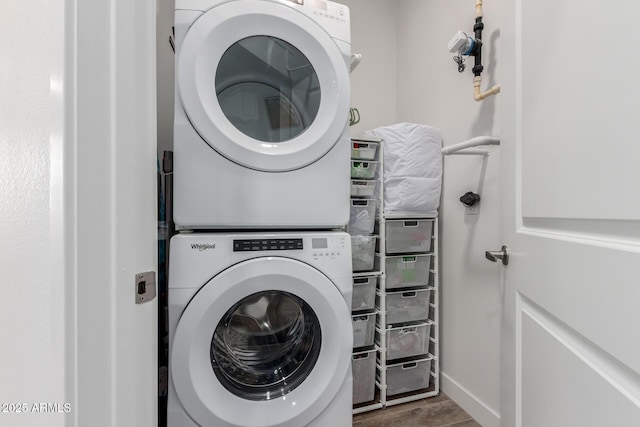 2511 W Queen Creek Rd Unit 174, Chandler, AZ 85248 - washroom with stacked washer / dryer and wood finished floors