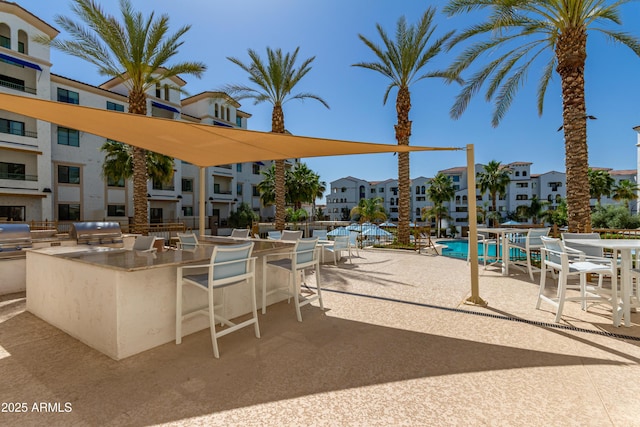 2511 W Queen Creek Rd Unit 174, Chandler, AZ 85248 - view of patio with a residential view and a community pool