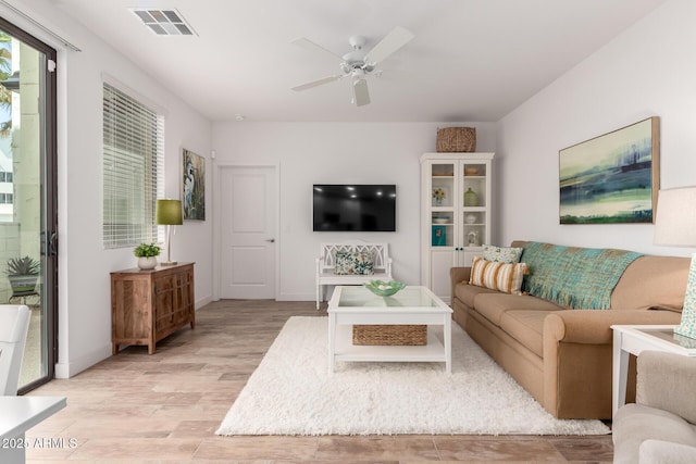 2511 W Queen Creek Rd Unit 174, Chandler, AZ 85248 - living room featuring light wood-style floors and ceiling fan