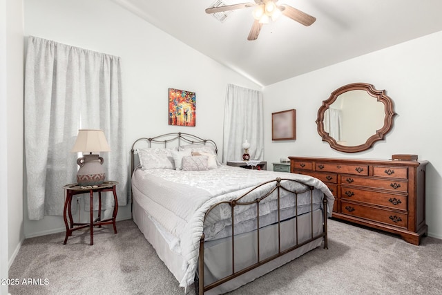 bedroom with ceiling fan, lofted ceiling, and light carpet