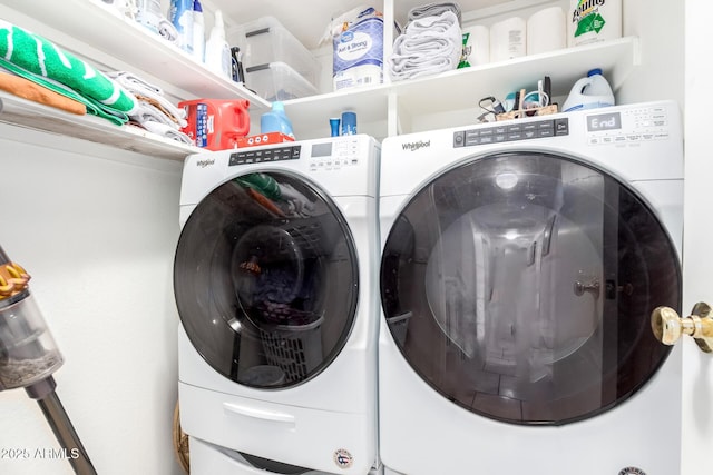 laundry room featuring laundry area and washer and clothes dryer