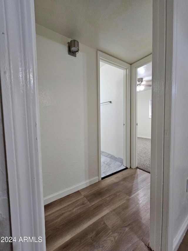 corridor featuring light hardwood / wood-style flooring