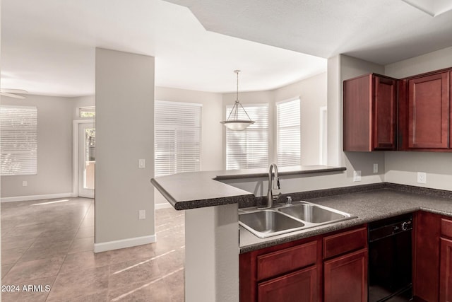 kitchen with plenty of natural light, dishwasher, sink, and kitchen peninsula