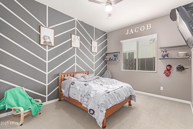 bedroom featuring carpet floors, baseboards, and a ceiling fan