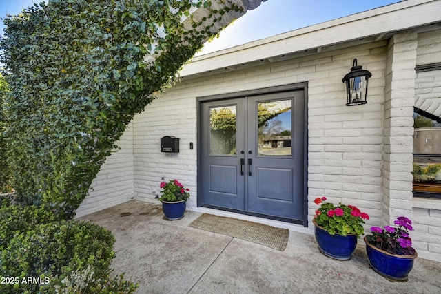 doorway to property with french doors