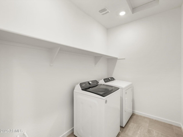 washroom with visible vents, recessed lighting, separate washer and dryer, baseboards, and laundry area