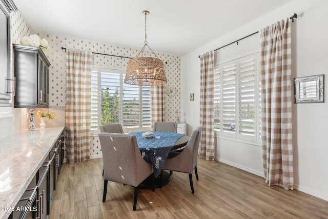 14204 S 179th Ln, Goodyear, AZ 85338 - dining space with baseboards and light wood-type flooring