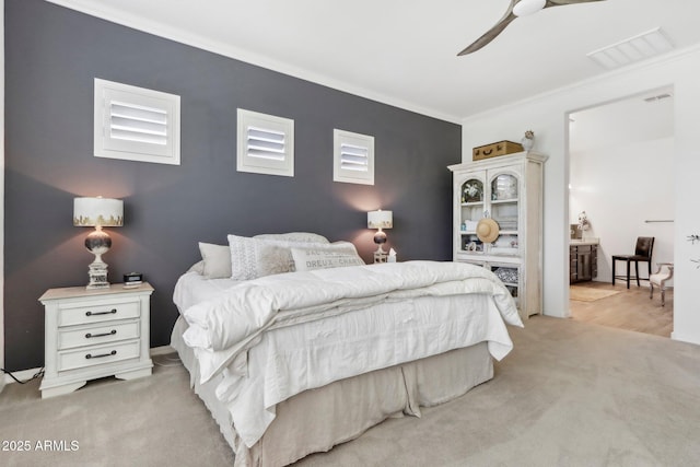 14204 S 179th Ln, Goodyear, AZ 85338 - bedroom featuring crown molding, ceiling fan, light carpet, and visible vents
