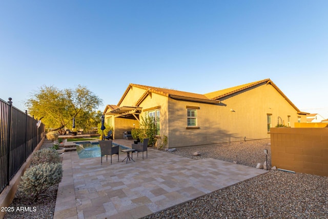 14204 S 179th Ln, Goodyear, AZ 85338 - view of patio with a fenced in pool, a fenced backyard, and outdoor lounge area