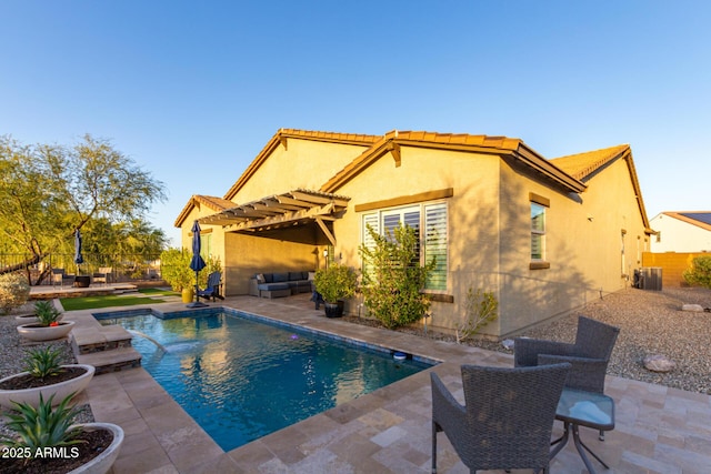 14204 S 179th Ln, Goodyear, AZ 85338 - back of house featuring a pergola, a patio, stucco siding, and a tile roof