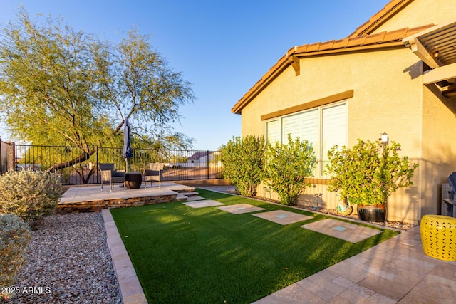 14204 S 179th Ln, Goodyear, AZ 85338 - view of yard featuring a patio area and fence