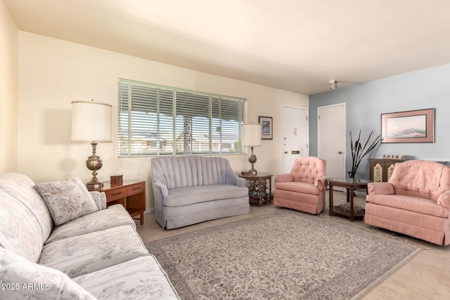 living room with light tile patterned flooring