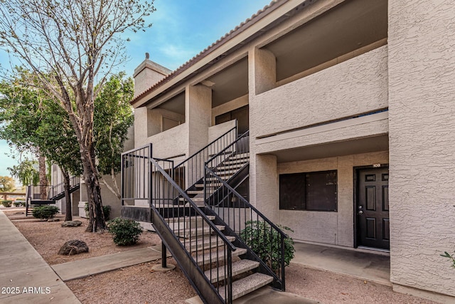 234 N 75th St Unit 209, Mesa, AZ 85207 - view of property featuring stairway