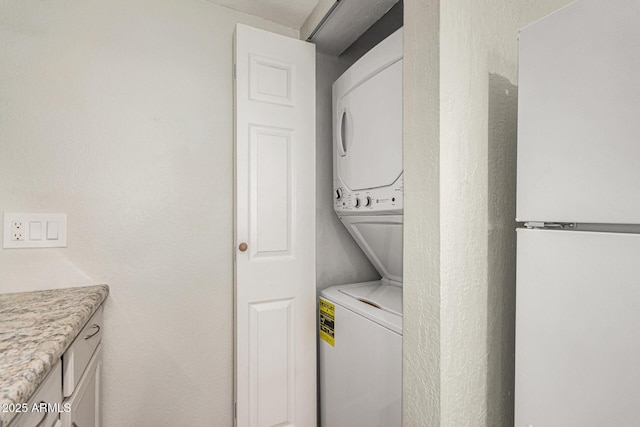 234 N 75th St Unit 209, Mesa, AZ 85207 - laundry room featuring stacked washer and clothes dryer