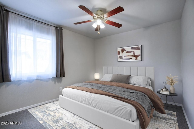 bedroom featuring ceiling fan and carpet floors