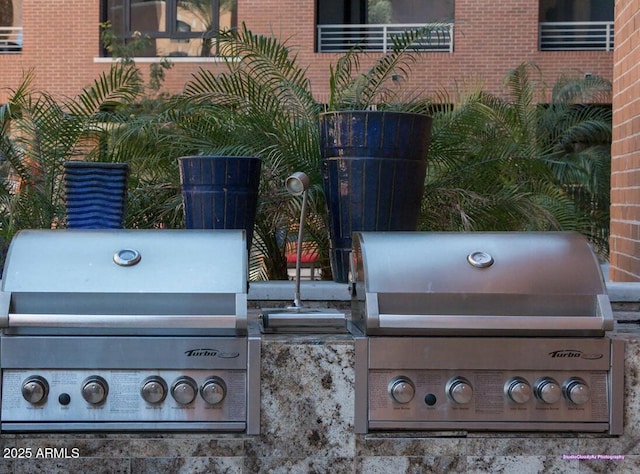 view of patio featuring a grill