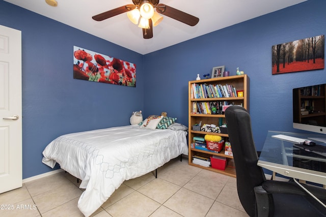 tiled bedroom with ceiling fan