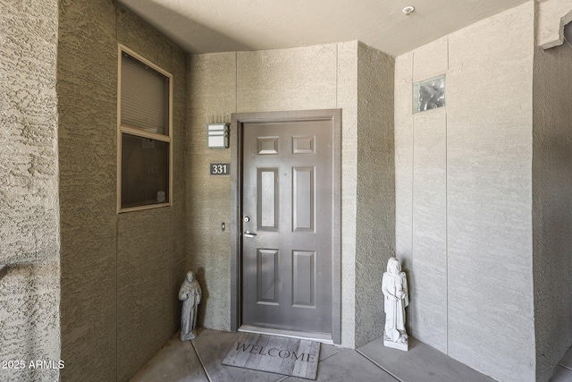 5303 N 7th St Unit 331, Phoenix, AZ 85014 - view of exterior entry with stucco siding