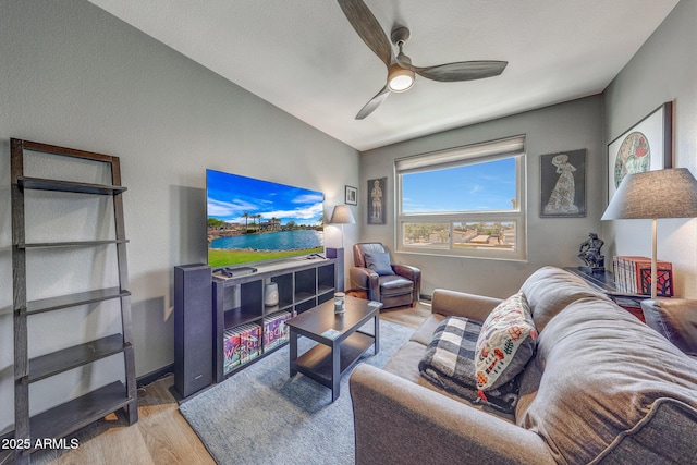 5303 N 7th St Unit 331, Phoenix, AZ 85014 - living room with wood finished floors and ceiling fan