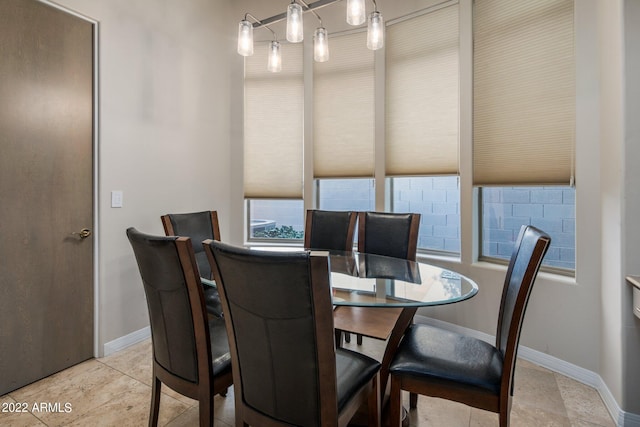 dining room featuring light tile flooring