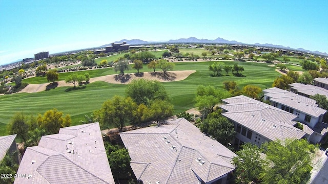 birds eye view of property with a mountain view