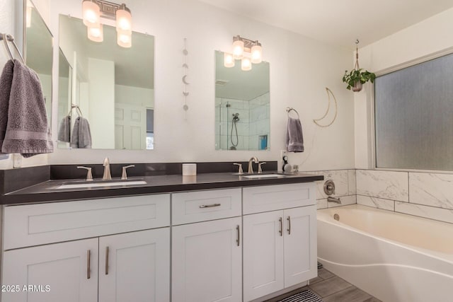 1583 N Constellation Ct, Gilbert, AZ 85234 - full bathroom featuring double vanity, a garden tub, and a shower