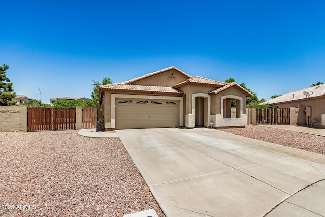 1583 N Constellation Ct, Gilbert, AZ 85234 - mediterranean / spanish home featuring stucco siding, a garage, a tile roof, a gate, and concrete driveway
