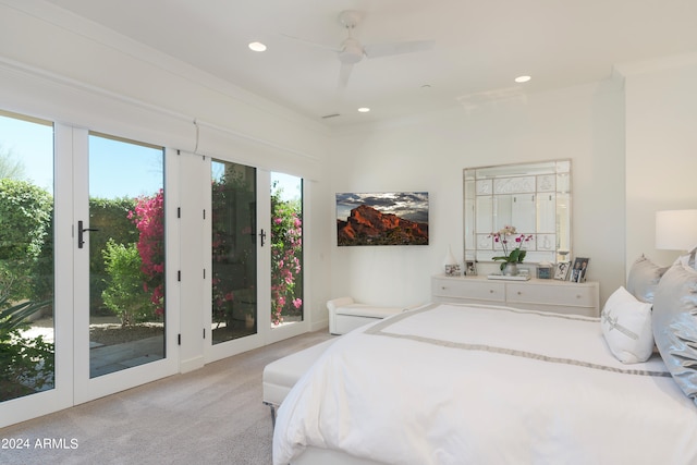 carpeted bedroom featuring ornamental molding, ceiling fan, and access to exterior