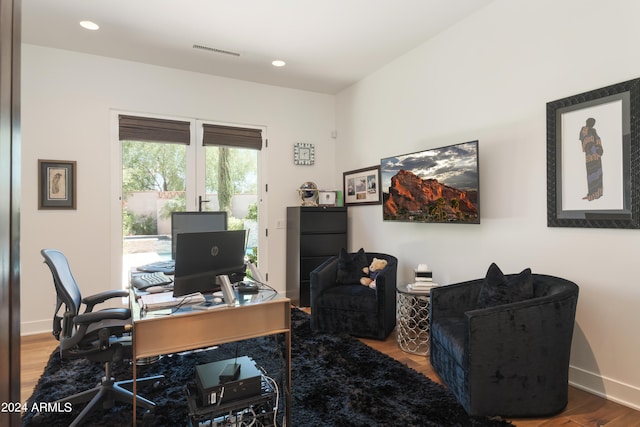 office area with hardwood / wood-style floors