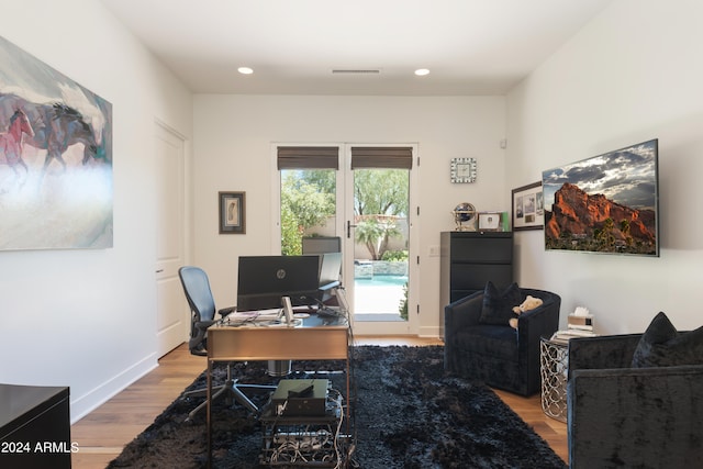 office featuring hardwood / wood-style flooring