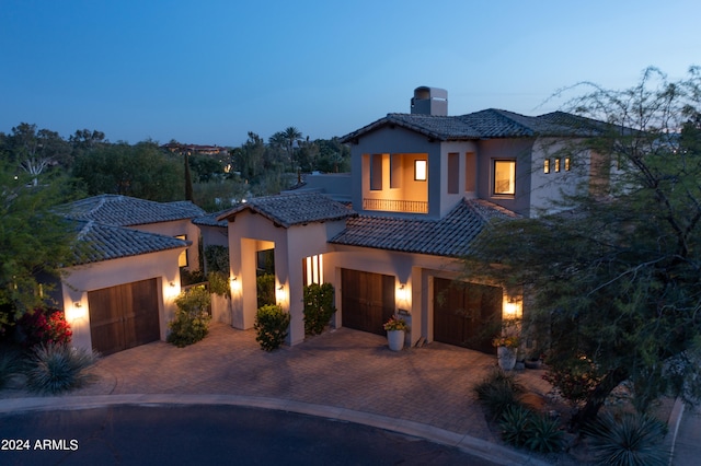 view of front of property with a garage