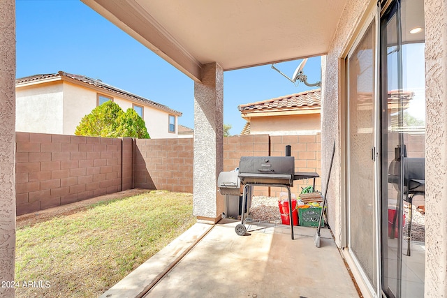 view of patio with a grill