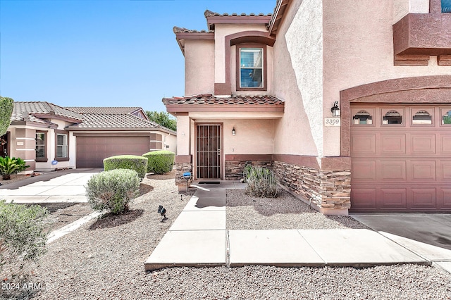 view of front of home featuring a garage