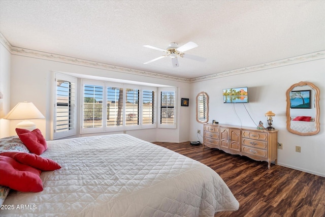 bedroom with a textured ceiling, ornamental molding, wood finished floors, and a ceiling fan