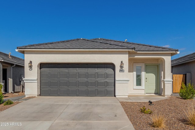 view of front of home with a garage