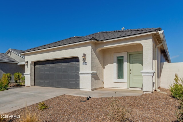 view of front of property featuring a garage