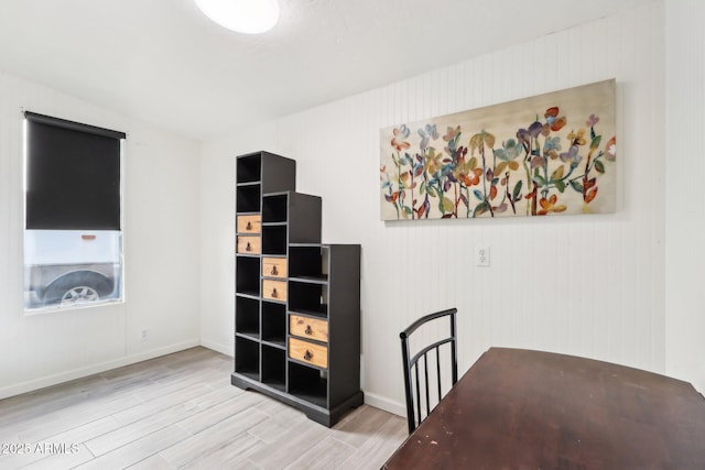 office with light wood-type flooring