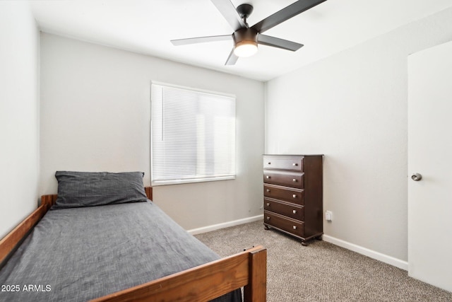 bedroom featuring light carpet and ceiling fan