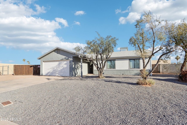 single story home featuring a garage