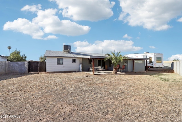 rear view of property with a patio area