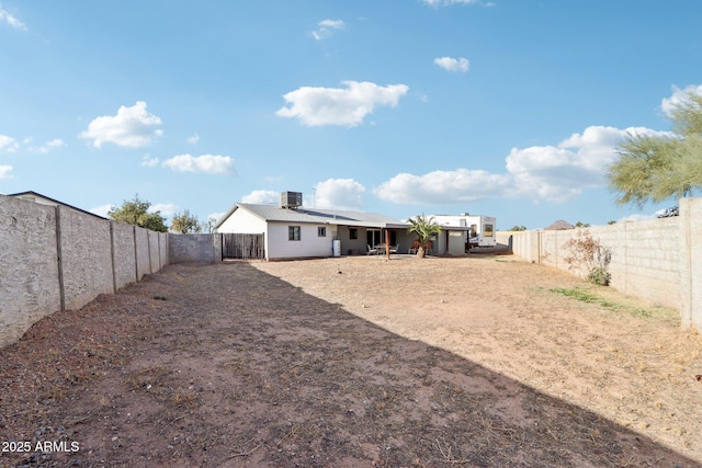 view of yard featuring central air condition unit