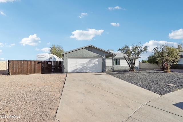 single story home featuring a garage