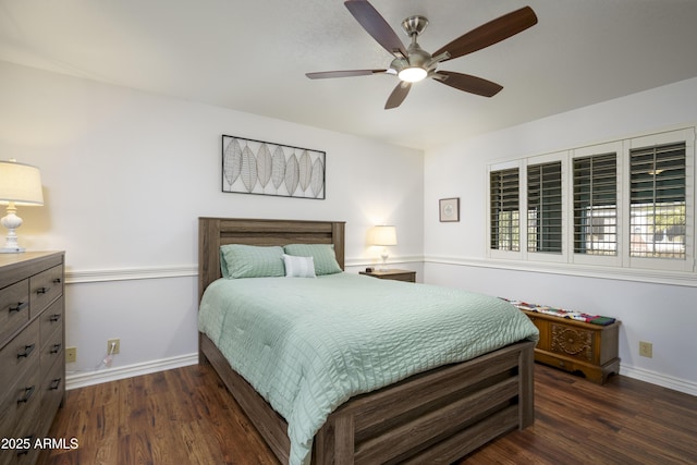 bedroom featuring dark hardwood / wood-style floors and ceiling fan